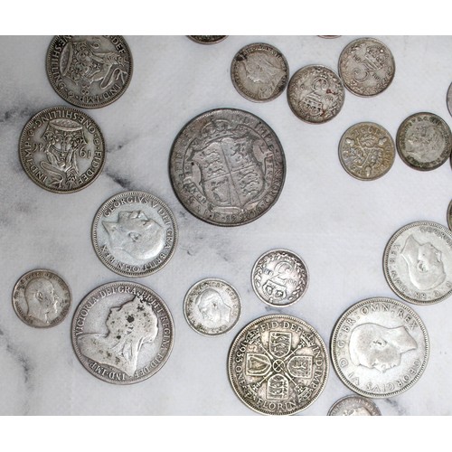 383 - A Selection Of Coins Including Florins, Shillings, Sixpence And Threepence
Weight 200g