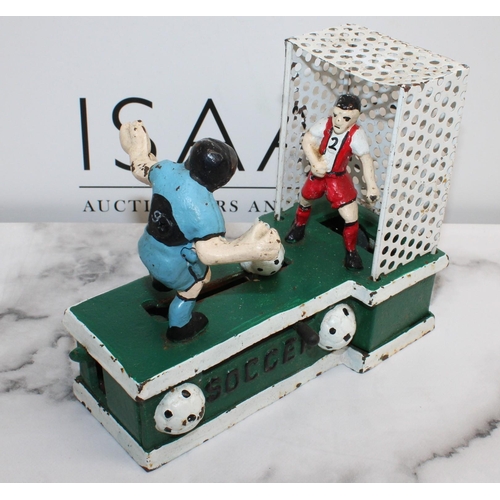 38 - Vintage Cast Iron Mechanical Soccer Coin Bank 
Length-19.5cm
All Proceeds Go To Charity