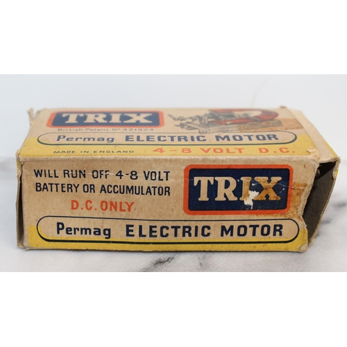 611 - Boxed Trix Permag Electric Motor 
Will Run Off 4-8 Volt Battery
Untested