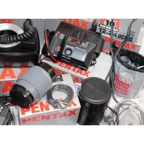 11 - Large Quantity Of PENTAX Camera's & Accessories/Binoculars Most In Original Boxes