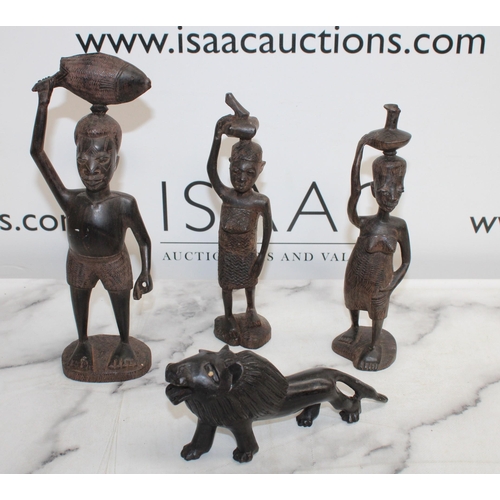 31 - Four Wooden Native Figurines/Lion Tallest 24.5cm