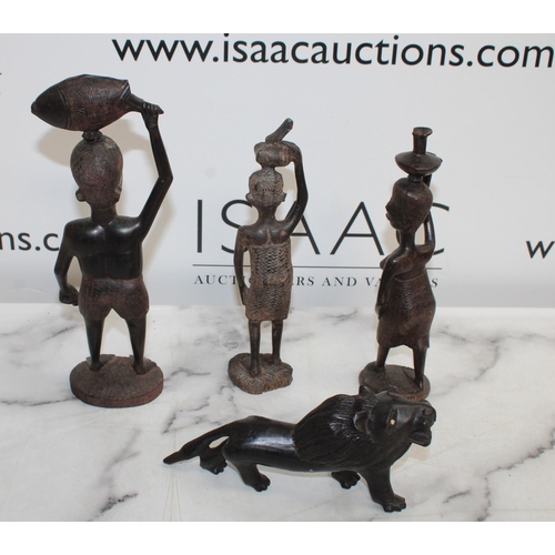 31 - Four Wooden Native Figurines/Lion Tallest 24.5cm