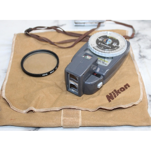 15 - NIKON F2 7927955 Camera. Complete with Three Lenses, Accessories and Carry Bag