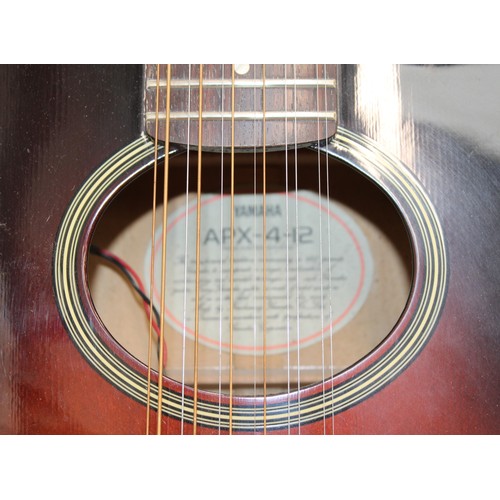 218 - YAMAHA APX-4-12 Electro Acoustic 12 String Guitar In Original Box Untested
COLLECTION ONLY