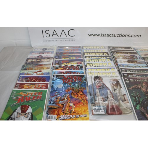 25 - A Large Quantity Of Comics Including, Speed Racer, Speed Racer X, Eureka, Stingers, Serinity, Tomb R...