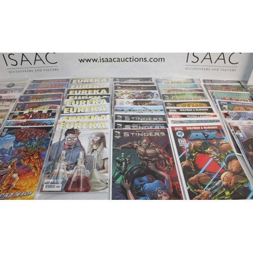 25 - A Large Quantity Of Comics Including, Speed Racer, Speed Racer X, Eureka, Stingers, Serinity, Tomb R...