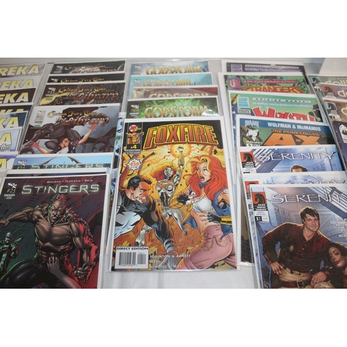 25 - A Large Quantity Of Comics Including, Speed Racer, Speed Racer X, Eureka, Stingers, Serinity, Tomb R...