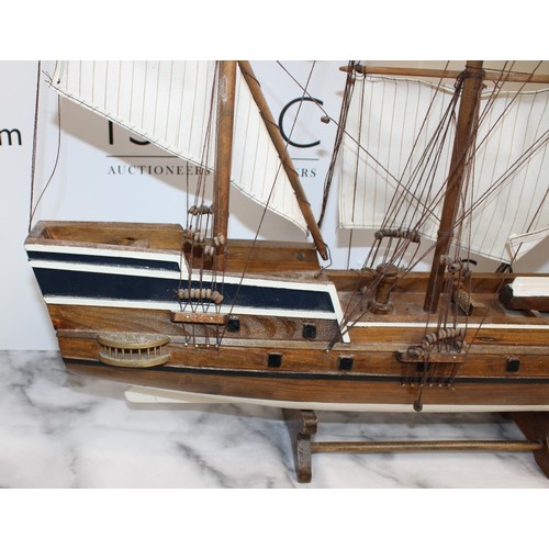 166 - Wooden Ship On Stand Length 73cm Height 82cm
COLLECTION ONLY