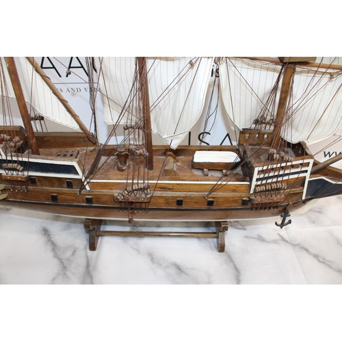 166 - Wooden Ship On Stand Length 73cm Height 82cm
COLLECTION ONLY