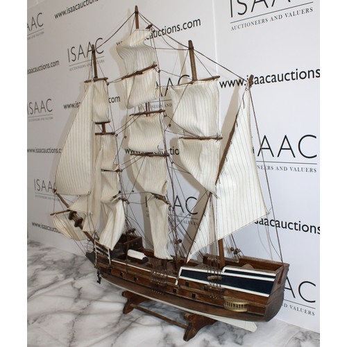 166 - Wooden Ship On Stand Length 73cm Height 82cm
COLLECTION ONLY