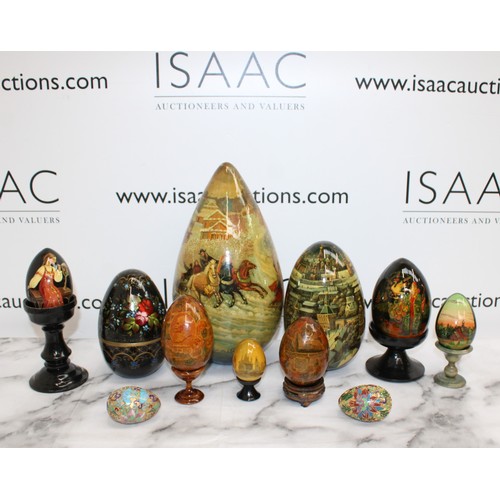 181 - Eleven Russian Wooden/Metal Hand Painted Decorative Eggs Largest-29cm Some On Stands