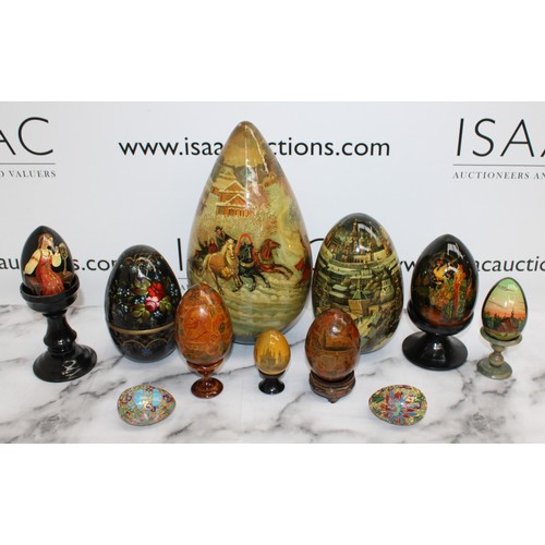 181 - Eleven Russian Wooden/Metal Hand Painted Decorative Eggs Largest-29cm Some On Stands