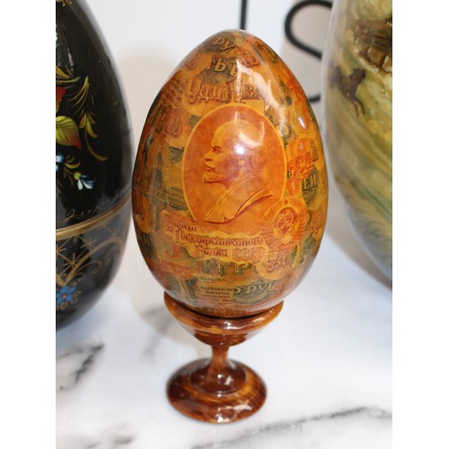 181 - Eleven Russian Wooden/Metal Hand Painted Decorative Eggs Largest-29cm Some On Stands