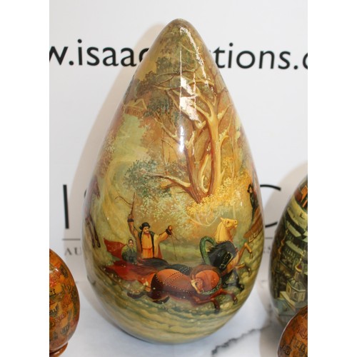 181 - Eleven Russian Wooden/Metal Hand Painted Decorative Eggs Largest-29cm Some On Stands