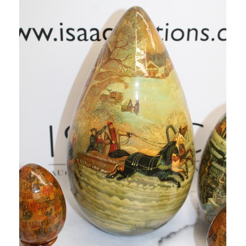 181 - Eleven Russian Wooden/Metal Hand Painted Decorative Eggs Largest-29cm Some On Stands