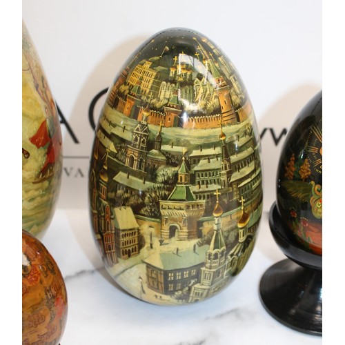 181 - Eleven Russian Wooden/Metal Hand Painted Decorative Eggs Largest-29cm Some On Stands