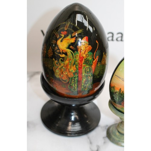 181 - Eleven Russian Wooden/Metal Hand Painted Decorative Eggs Largest-29cm Some On Stands