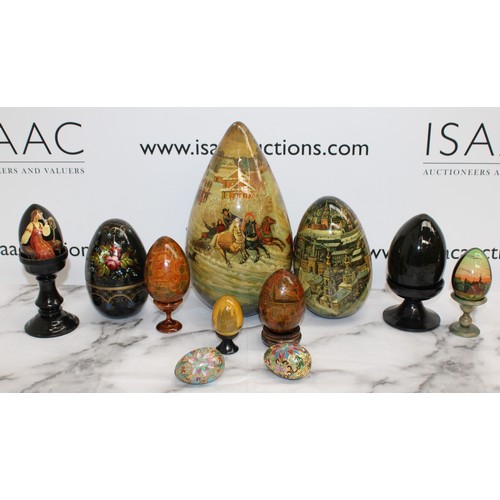 181 - Eleven Russian Wooden/Metal Hand Painted Decorative Eggs Largest-29cm Some On Stands