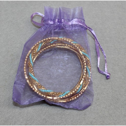 407 - 7 x Asian Gold Tone Bangles