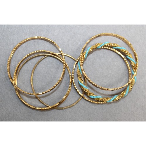 407 - 7 x Asian Gold Tone Bangles