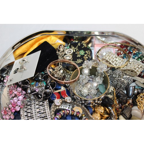 410 - A Quantity Of Mixed Jewellery Items In A Tin