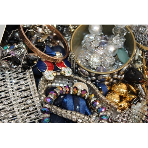 410 - A Quantity Of Mixed Jewellery Items In A Tin