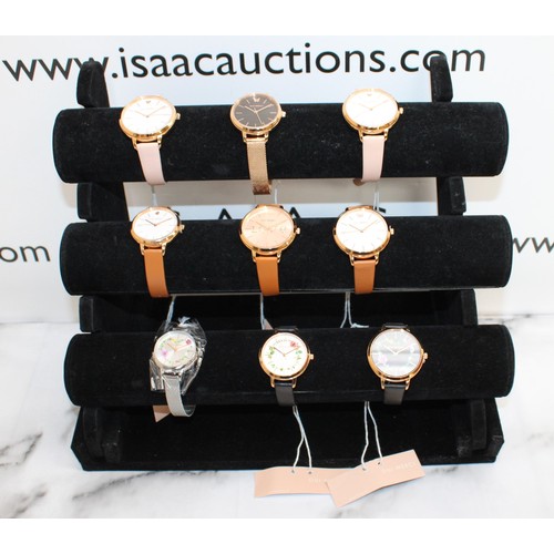 579 - 9 x New OUI. MERCI Watches All Untested With Tags
Display Not Included