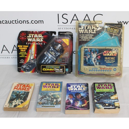 660 - 4 x Star-Wars Books And 2 x Boxed Star-wars Toys 
Electromic Comm Talk Untested
Star-Wars Quiz Whizz... 