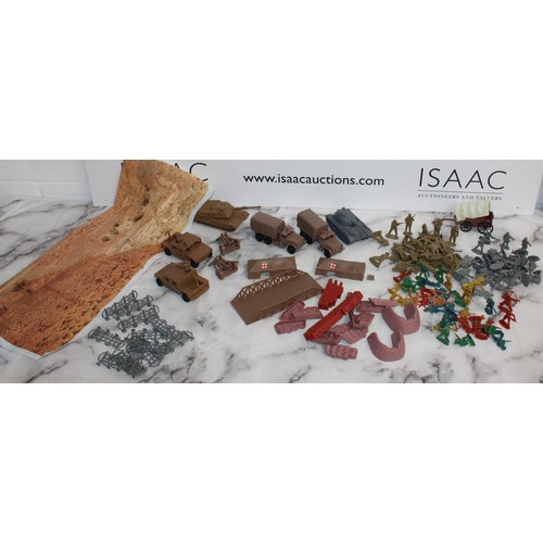 698 - A Box Of Military Vehicles, Soldiers And Accessories