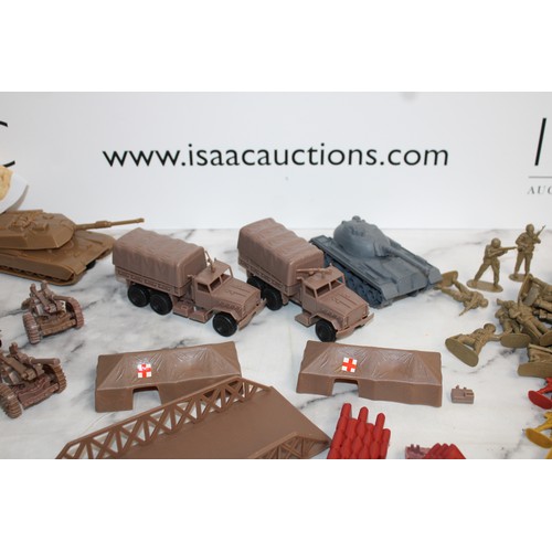 698 - A Box Of Military Vehicles, Soldiers And Accessories