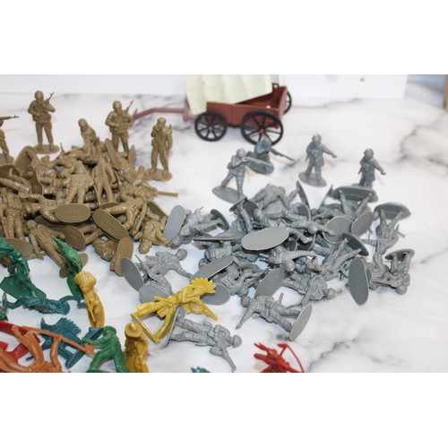 698 - A Box Of Military Vehicles, Soldiers And Accessories