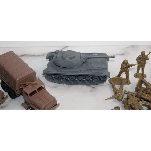 698 - A Box Of Military Vehicles, Soldiers And Accessories