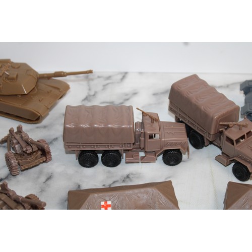 698 - A Box Of Military Vehicles, Soldiers And Accessories