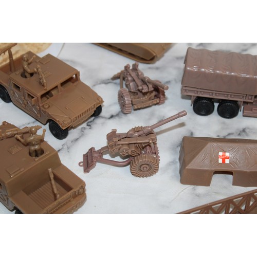 698 - A Box Of Military Vehicles, Soldiers And Accessories