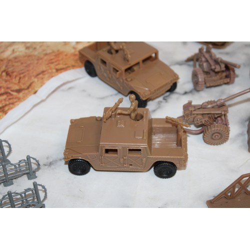 698 - A Box Of Military Vehicles, Soldiers And Accessories