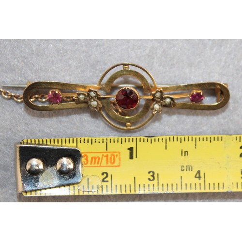 534 - Stamped 375 Gold Garnet & Pearl Brooch Total Weight-2.81g
In A Box