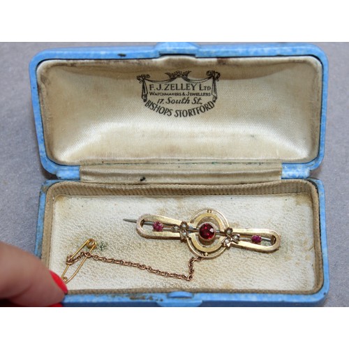 534 - Stamped 375 Gold Garnet & Pearl Brooch Total Weight-2.81g
In A Box