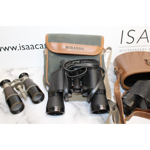 133 - A Selection Of Binoculars Four in Cases And One Without All Untested