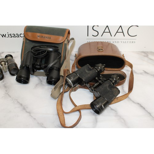 133 - A Selection Of Binoculars Four in Cases And One Without All Untested