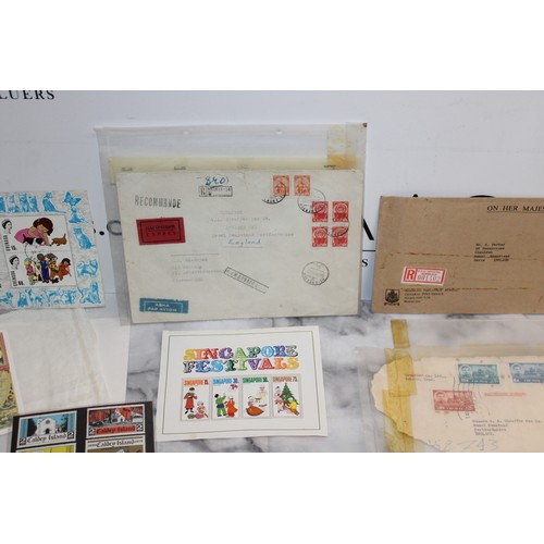 37 - Folder Containing Mixed Collectable Worldwide Stamps Franked & Unfranked...