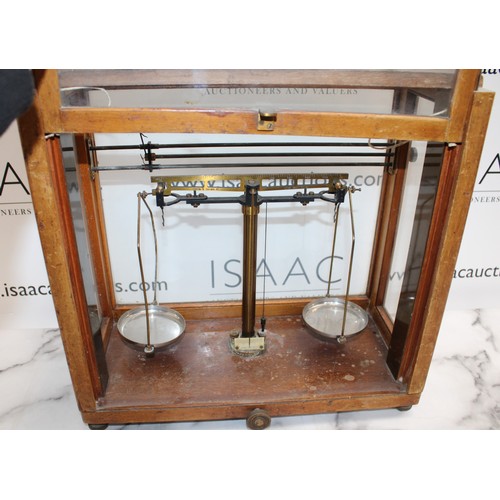 153 - H. N. Government Issued Scales In Wooden/Glass Case 42cm x 42cm x 19cm
COLLECTION ONLY