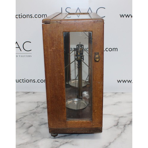 153 - H. N. Government Issued Scales In Wooden/Glass Case 42cm x 42cm x 19cm
COLLECTION ONLY