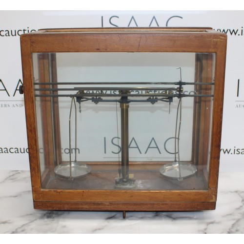 153 - H. N. Government Issued Scales In Wooden/Glass Case 42cm x 42cm x 19cm
COLLECTION ONLY