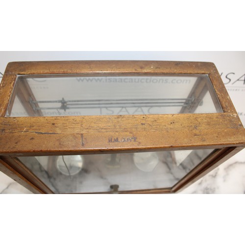 153 - H. N. Government Issued Scales In Wooden/Glass Case 42cm x 42cm x 19cm
COLLECTION ONLY