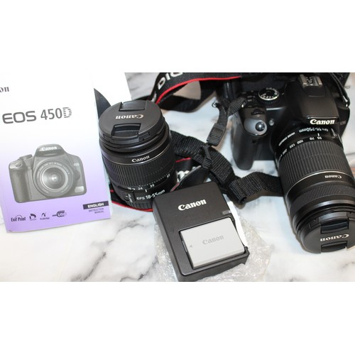 74 - Canon EOS450D Camera With Accessories. Other Accessories Including Tripod And NIKON Flash. 2 Pairs O... 