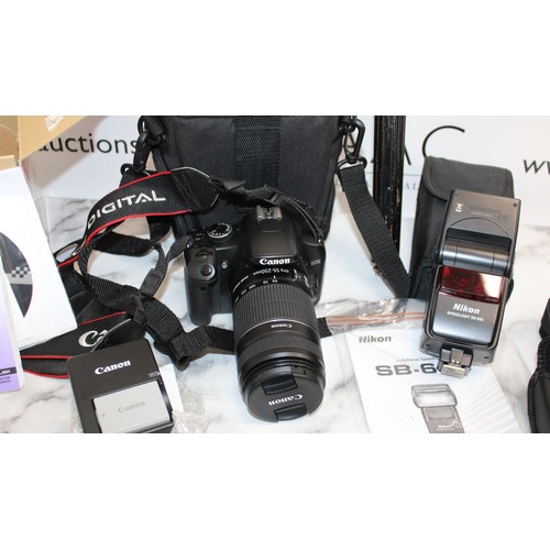 74 - Canon EOS450D Camera With Accessories. Other Accessories Including Tripod And NIKON Flash. 2 Pairs O... 