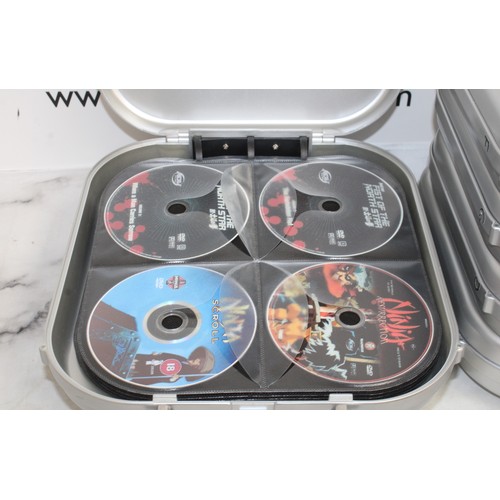 62 - 6 x CD Carry Cases Containing DVD's Unchecked