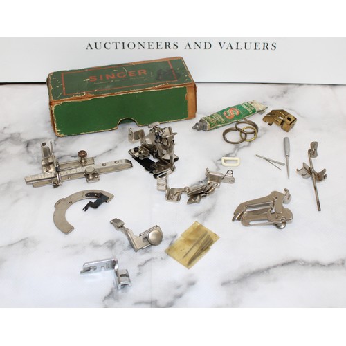 121 - A Selection Of Boxed Singer Sewing Machine Accessories