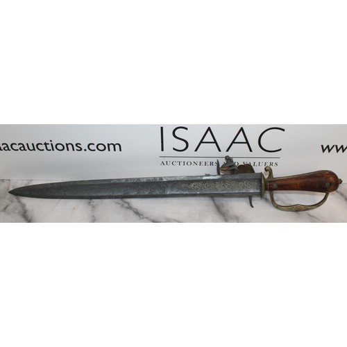 149 - Flint Lock Pistol Sword/Dagger Replica 1900's
Length 63cm
COLLECTION ONLY 
ID WILL BE NEEDED UPON CO... 