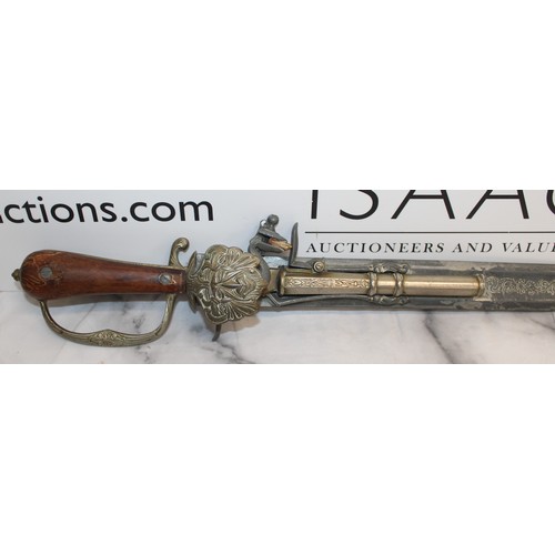 149 - Flint Lock Pistol Sword/Dagger Replica 1900's
Length 63cm
COLLECTION ONLY 
ID WILL BE NEEDED UPON CO... 